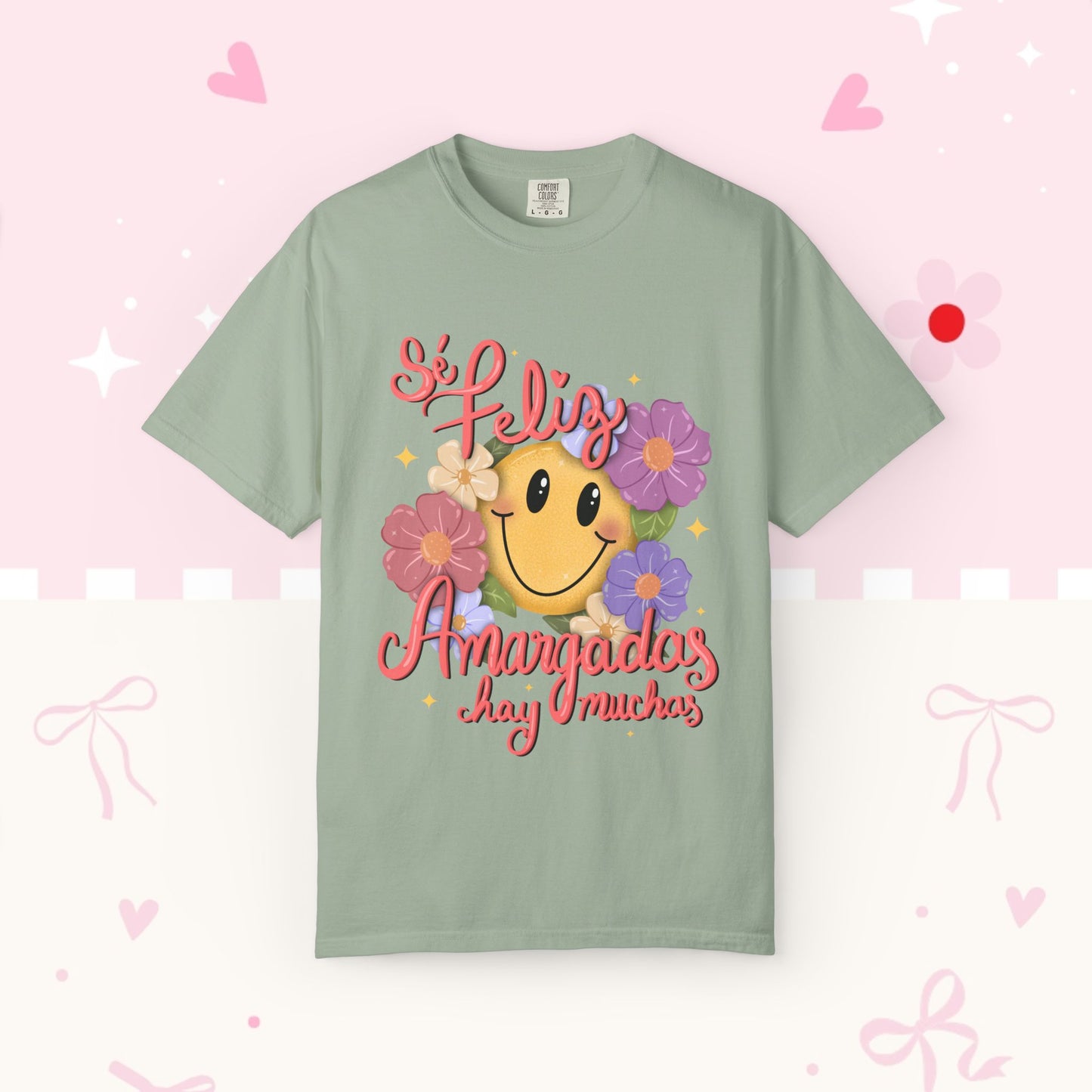 T-Shirt — "Si Felíz, Amargad@s Hay Muchos" Smiley Floral Graphic Tee